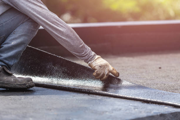 Professional Waterproofing technician working in Saint John, IN